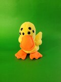 Yellow duck with extra eyes, duck plush