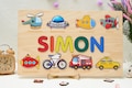 Custom Transportation Name Puzzle for Kids, Montessori Baby Gift with Cars, Trucks, Trains, and Planes, Ideal for Birthdays or Baby Showers