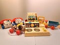 Set of 8 Fisher Price toys, 2x telephone, cash register, binoculars, car, kitchen, snoopy dog, sleep music box. Vintage, In one sale